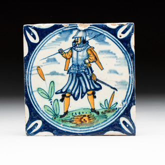 A polychrome Dutch Delft maiolica 'soldier' ​​medallion tile, late 16th C.