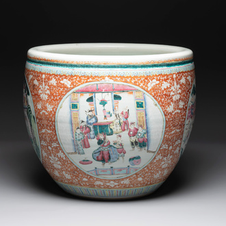 A large Chinese famille rose coral-red-ground fish bowl with narrative design, 19th C.