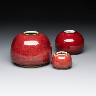 Three Chinese copper-red-glazed water pots, Kangxi mark, 19th C.