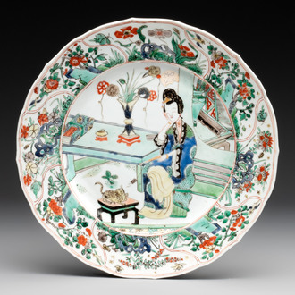 A Chinese famille verte 'lady and her cat' dish, Ding mark, Kangxi