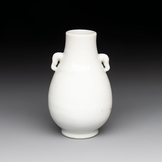 A small Chinese white-glazed 'hu' vase, Qianlong