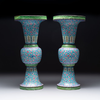 A pair of Chinese Canton enamel 'gu' vases with floral design, Qianlong