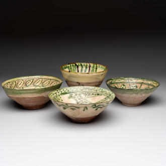 Four Amol pottery sgraffito bowls, Persia, 12th C.