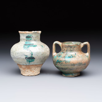 Two Raqqa turquoise-glazed pottery jars with black design, Syria, 12/13th C.
