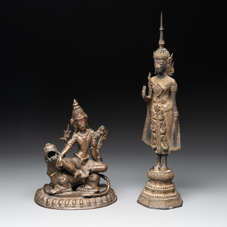 A bronze Simhanada Lokeshvara seated on a Buddhist lion and a Buddha, Southeast Asia, 19th C.