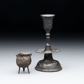 A miniature pewter candlestick and grape, excavated in Rotterdam, 16/17th C. or earlier