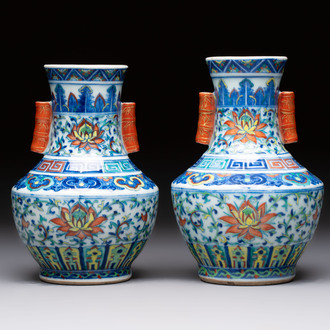 A pair of Chinese doucai 'Hu' vases with lotus scroll design, Qianlong mark, 19th C.