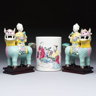 A pair of Chinese famille rose models of a boy riding a qilin and a bitong, 19/20th C.