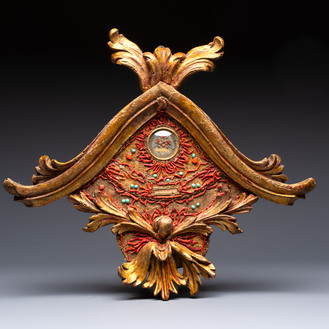 An Italian carved wood and coral- and turquoise-decorated reliquary containing a relic ex cineribus of Saint Teresa of Jesus, early 20th C.