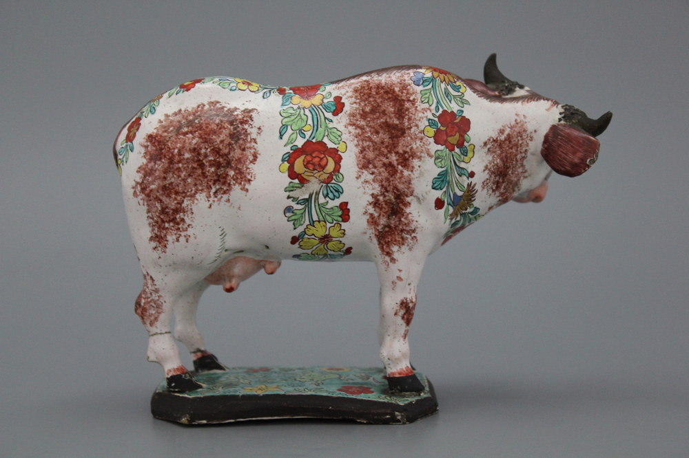 A petit feu and dor&eacute; Dutch Delft cow, 18th C.