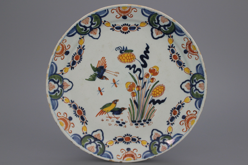 A polychrome Dutch Delft quail plate, early 18th C.