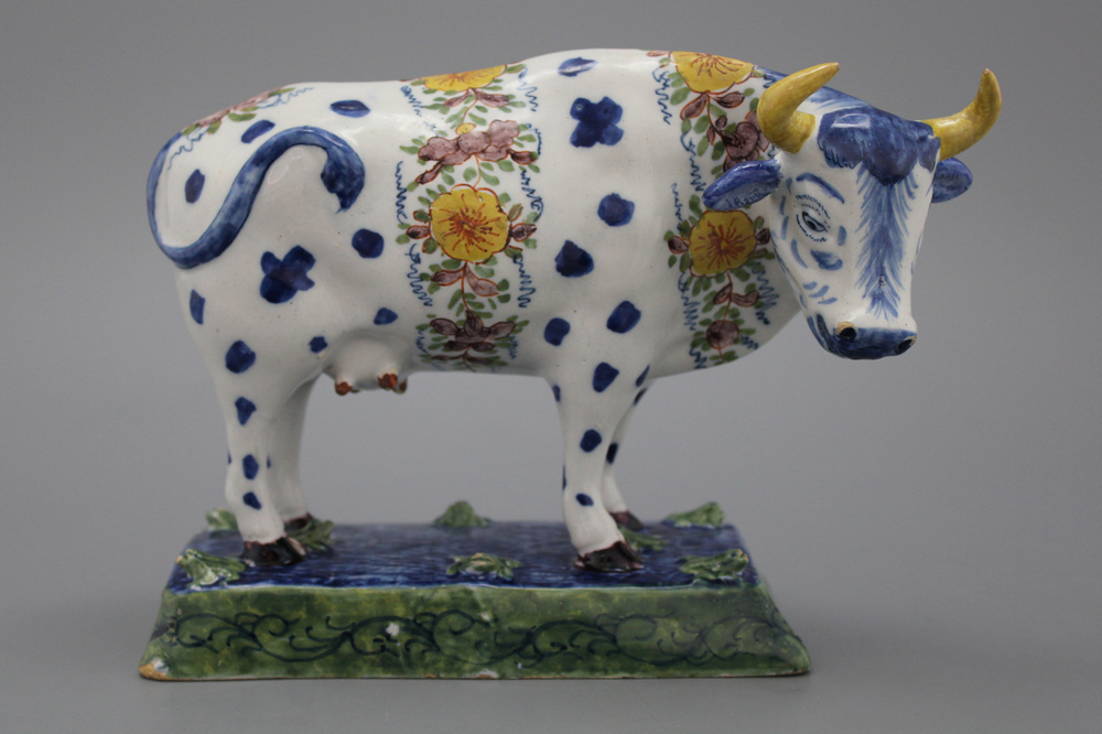 A polychrome Dutch Delft cow, 18th C.