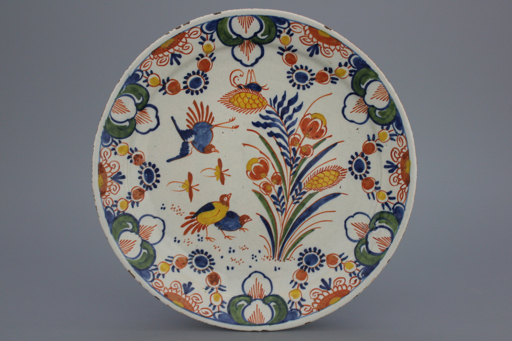 A polychrome Dutch Delft quail plate, 17/18th C.