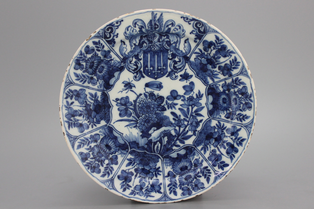 A Dutch Delft blue and white armorial plate, late 17th C.