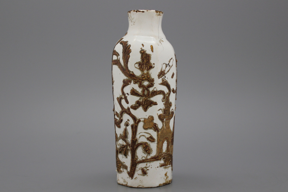 A German relief-decorated Ansbach or Berlin vase, 18th C.