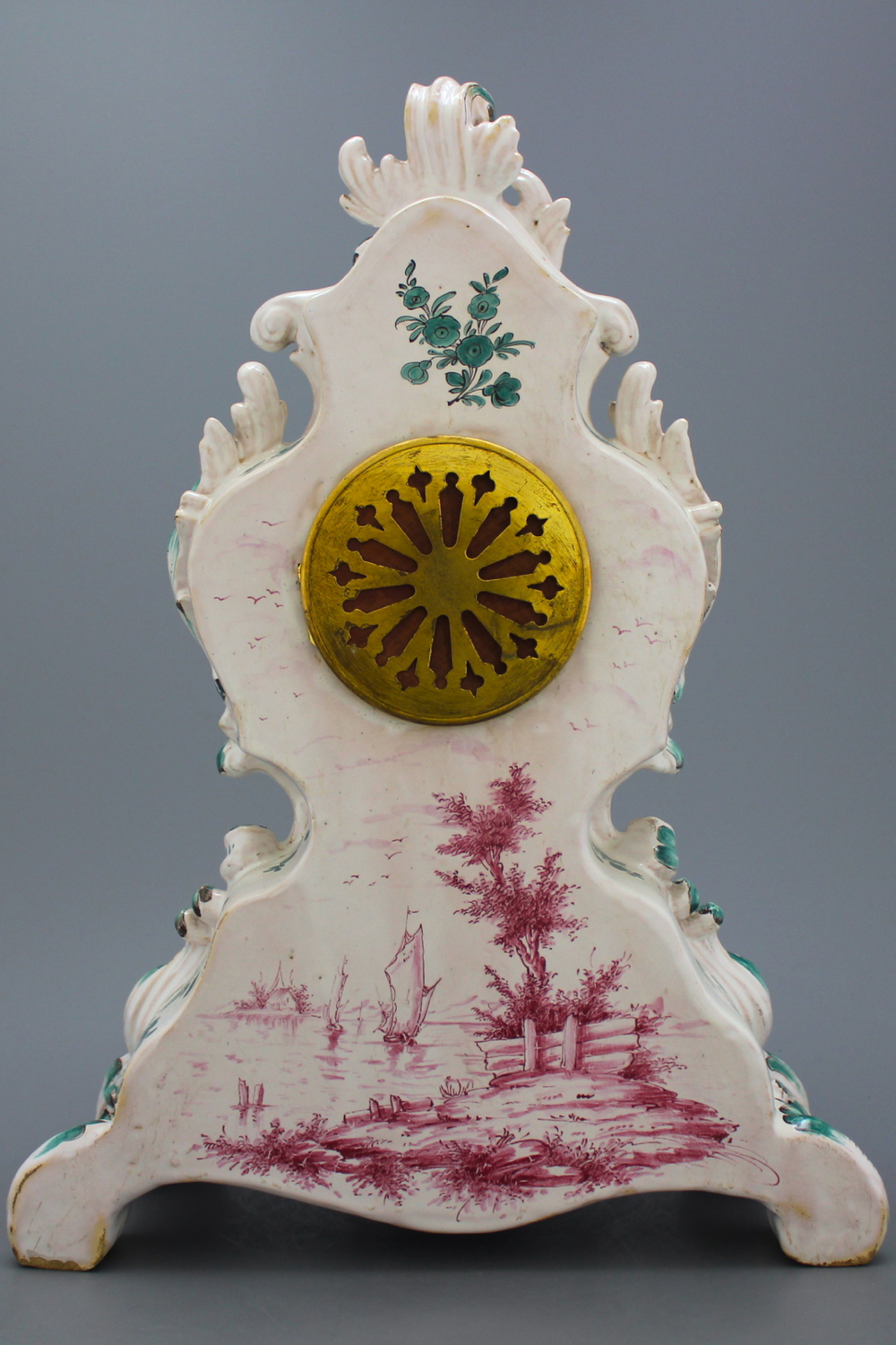 A large French faience de l'Est clock, 19th C.