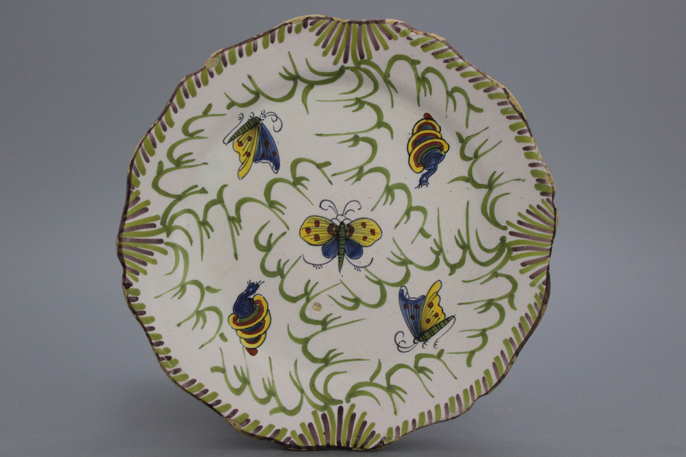 A Brussels faience butterfly plate, 18th C.