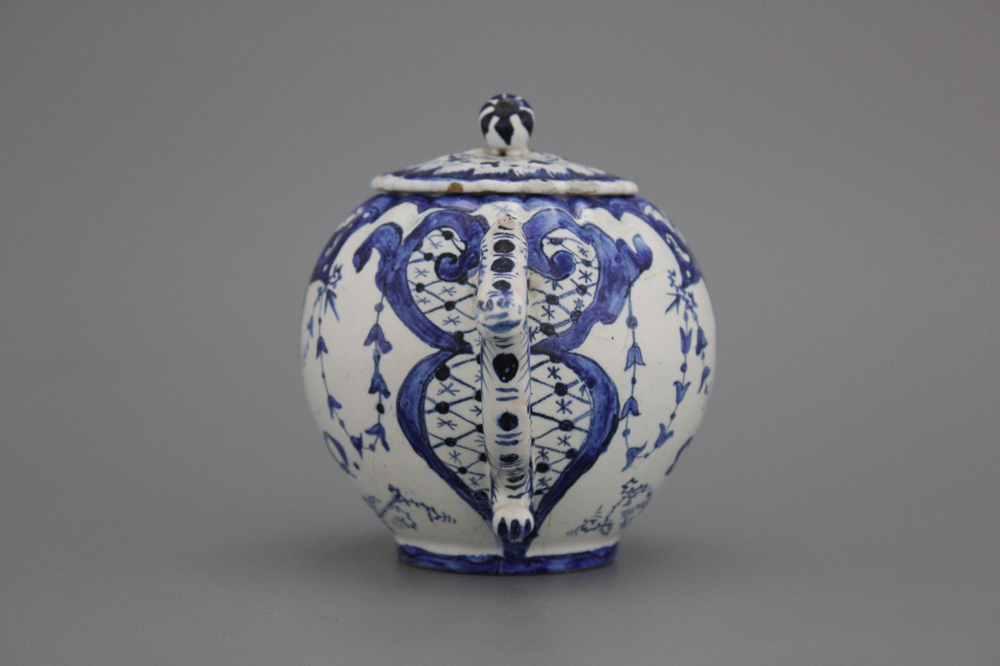 A French faience blue and white teapot, late 18th C.