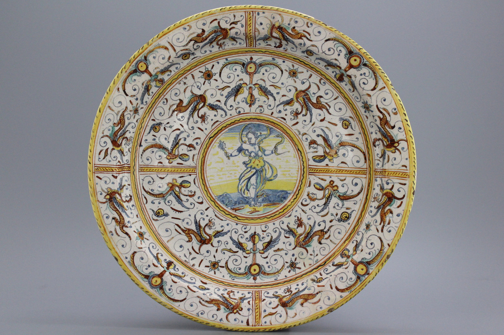 A massive Italian deruta charger with grotteschi depicting Prudence, ca. 1620