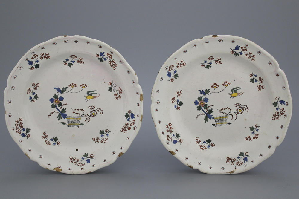 A pair of Brussels faience lobed &quot;floral hedge&quot; plates, 18th C.