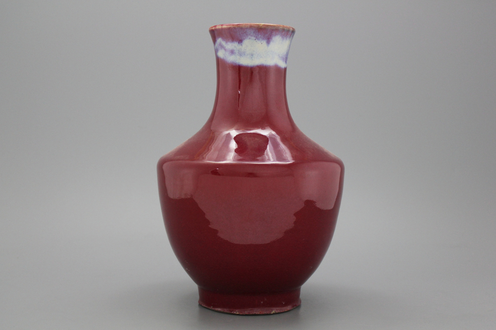 A Chinese porcelain flambe glazed bottle vase, 20th C.