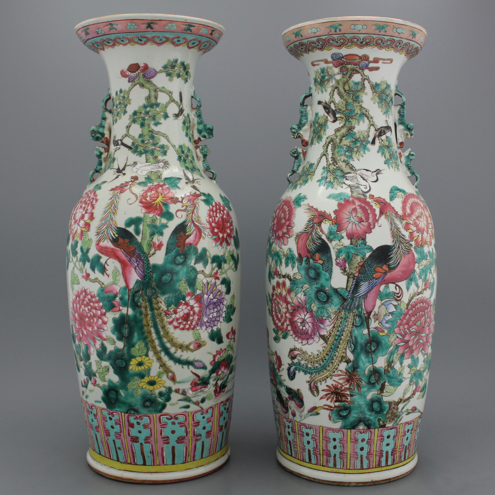A pair of Chinese porcelain famille rose vases, 19th C.