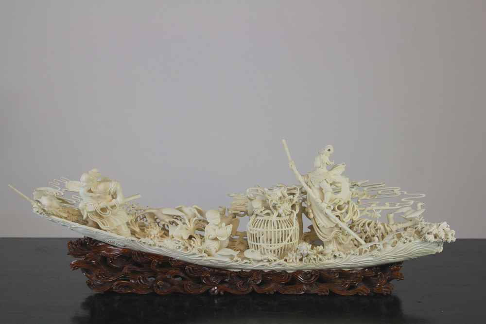 An important large Chinese ivory waterfront group on wood stand, Cultural Revolution