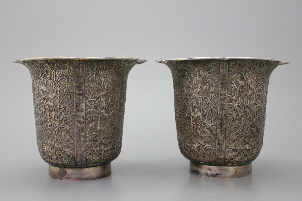 A pair of silver vases, Singapore or Cambodia, 20th C.