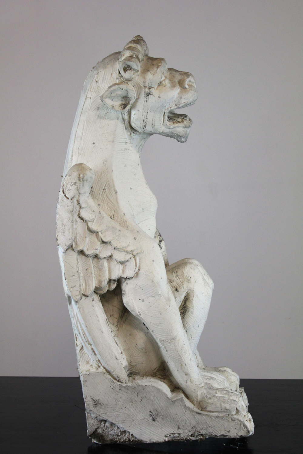 A large plaster cast of a gargoyle, workshop De Wispelaere, Bruges, 1st half 20th C.