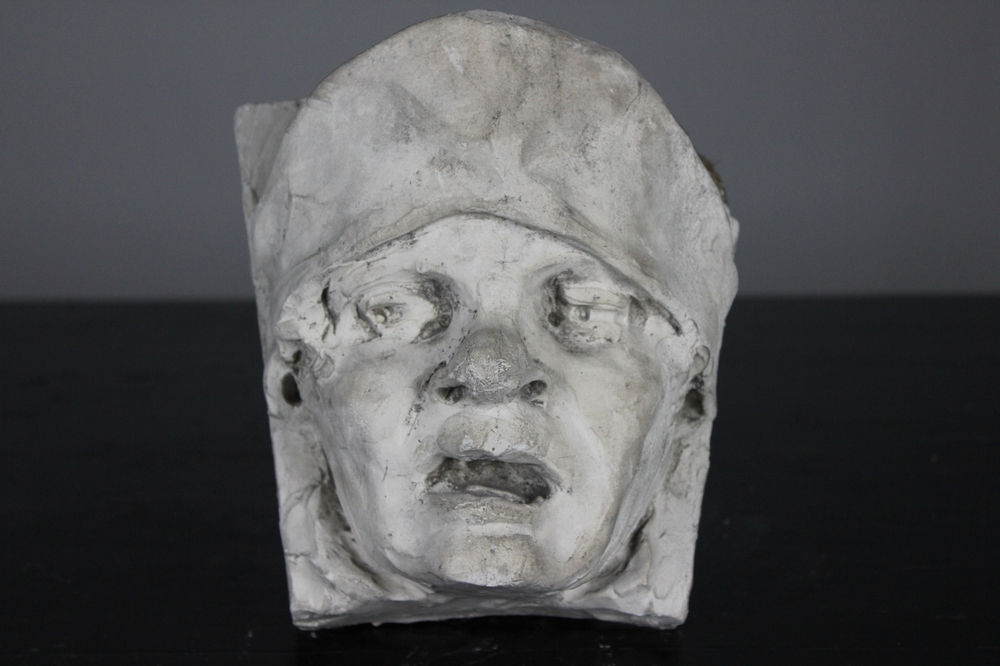 A plaster cast of a peasant's head, workshop De Wispelaere, Bruges, 1st half 20th C.