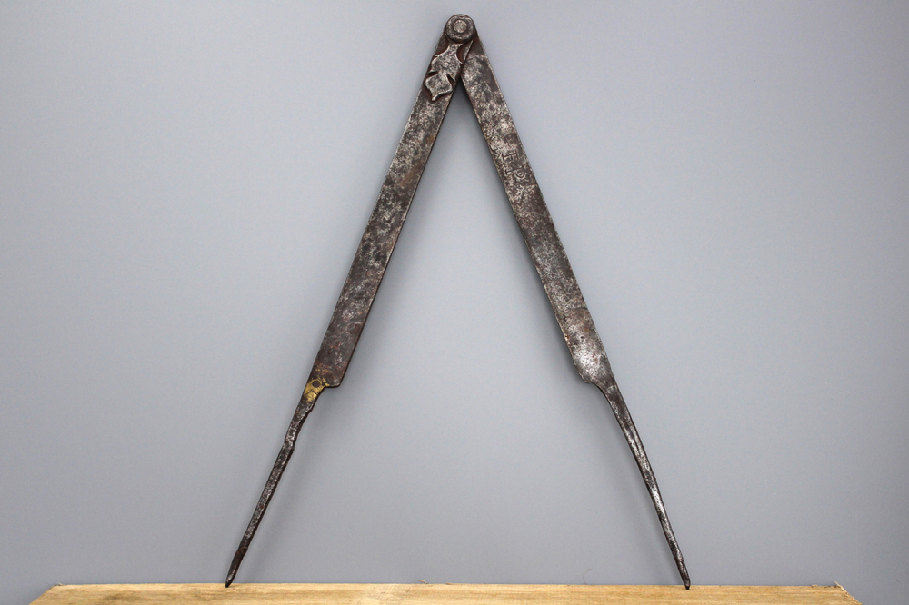 A large pair of iron compasses, 17/18th C.