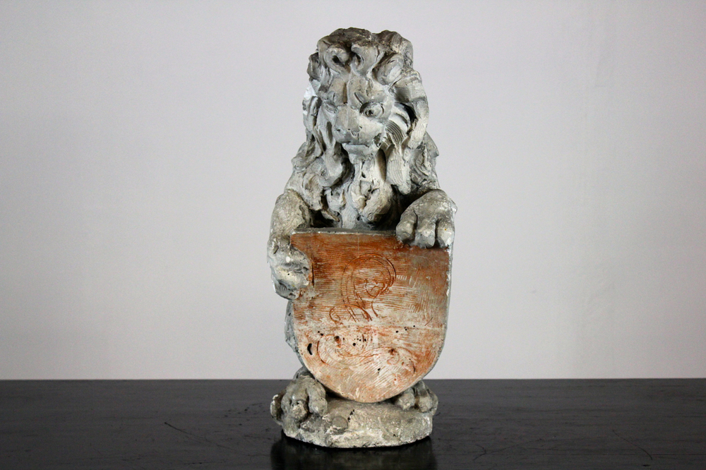 A plaster cast of a standing lion, workshop De Wispelaere, Bruges, 1st half 20th C.