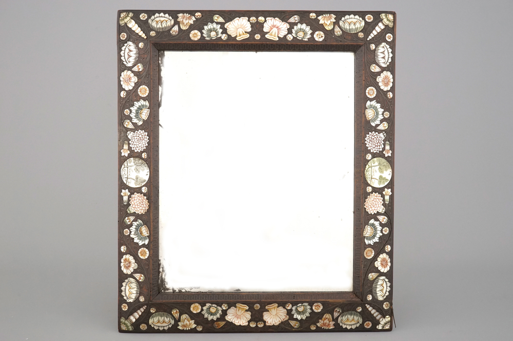 A &quot;Bois de Spa&quot; mother of pearl, stained horn, and brass inlaid mirror frame, 17th C.