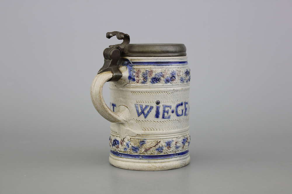 A rare Westerwald pewter-mounted inscribed beer mug, 17th C.