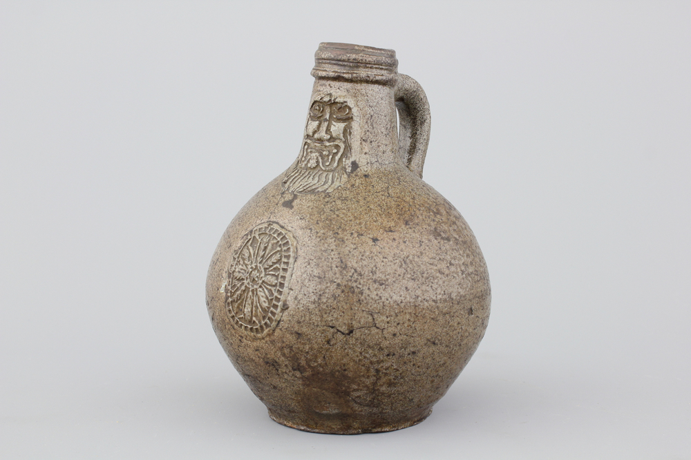 A Raeren stoneware bellarmine jug, 17th C.