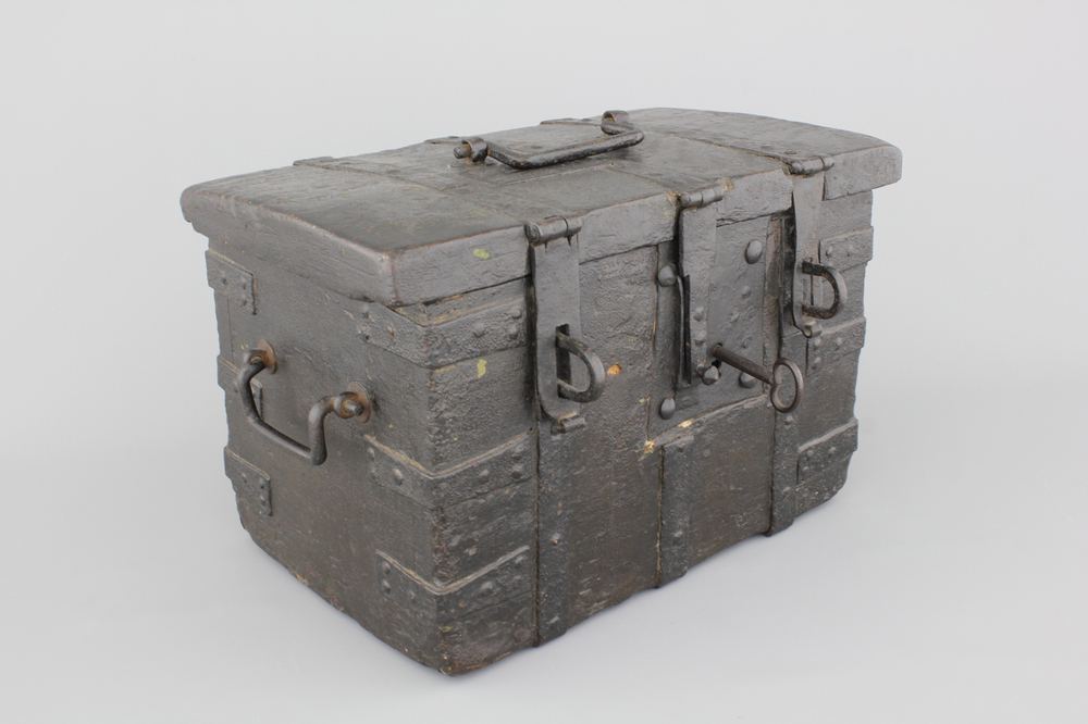 A cast iron and wood strong box, 17th C., The Netherlands