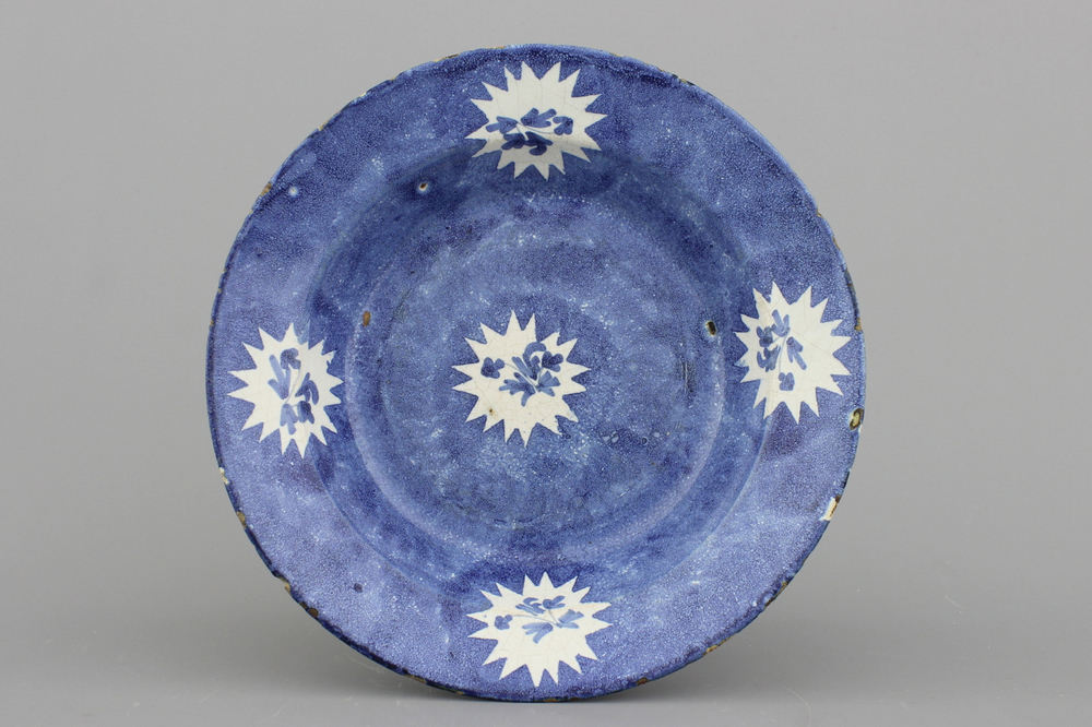 A Brussels faience blue ground plate, 18th C.