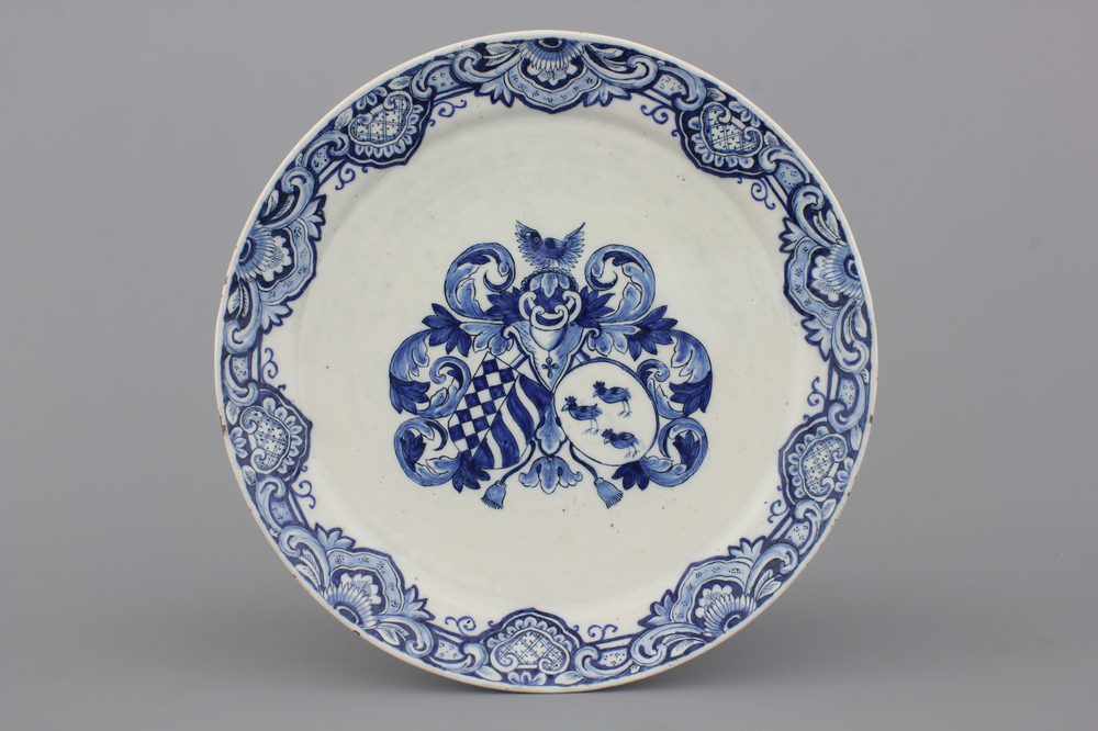 A Dutch Delft plate with a coat of arms, ca. 1700
