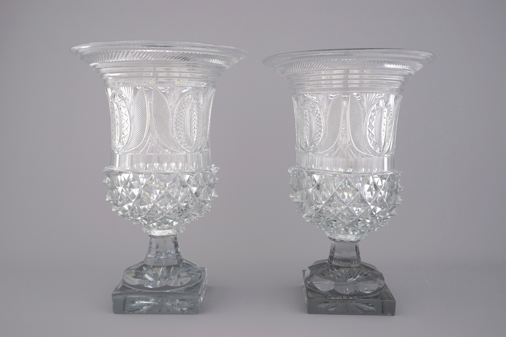 A pair of large cut glass urns on stand, probably Voneche, early 19th C.