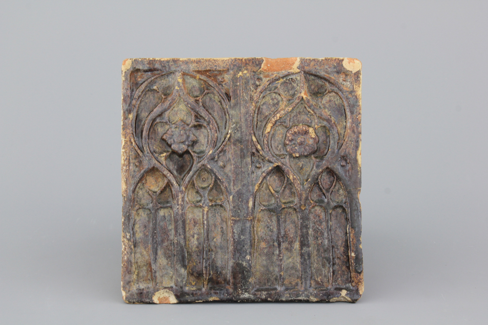 A German brown-glazed architectural stove tile, 16th .