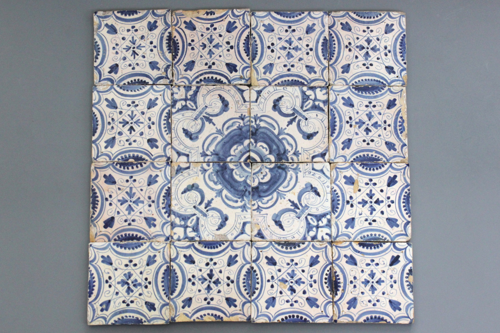 A set of 16 English Delft blue and white ornamental tiles, 17th C.