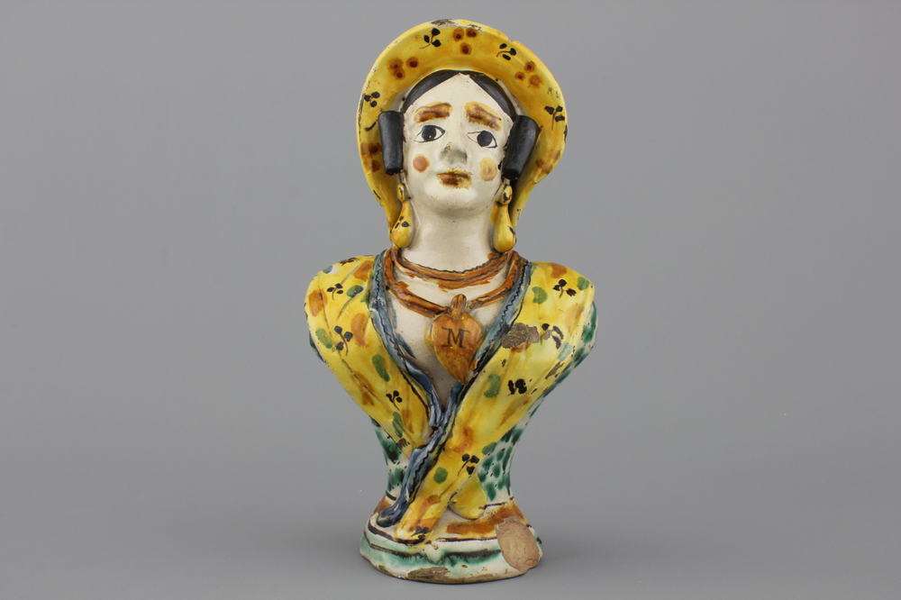 A South-Italian maiolica jug in the form of a lady, 18th C.
