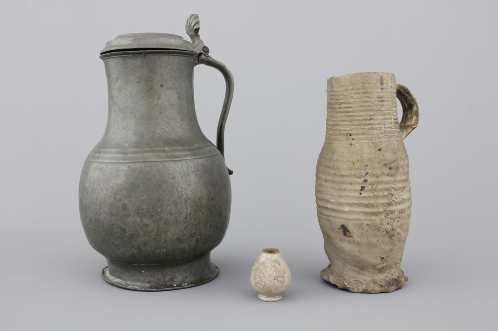 A Raeren stoneware jug, a pewter jug and a stoneware miniature, 15/18th C.