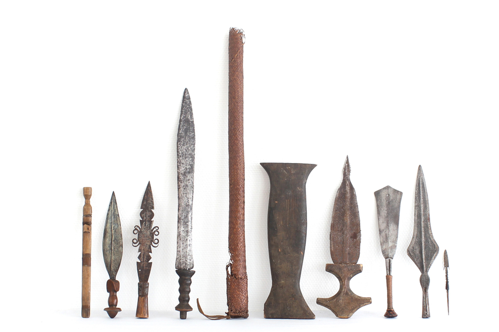 A collection of 23 various African tribal knifes and spears, 19/20th C.