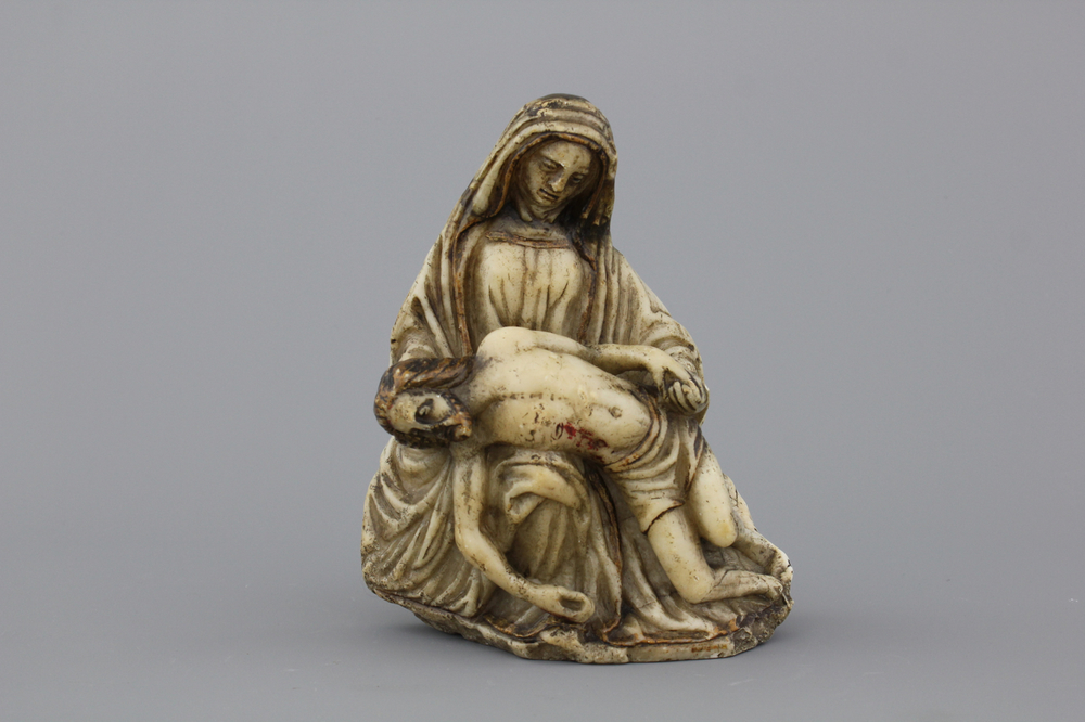 An alabaster sculpture of a pieta, 16/17th C.