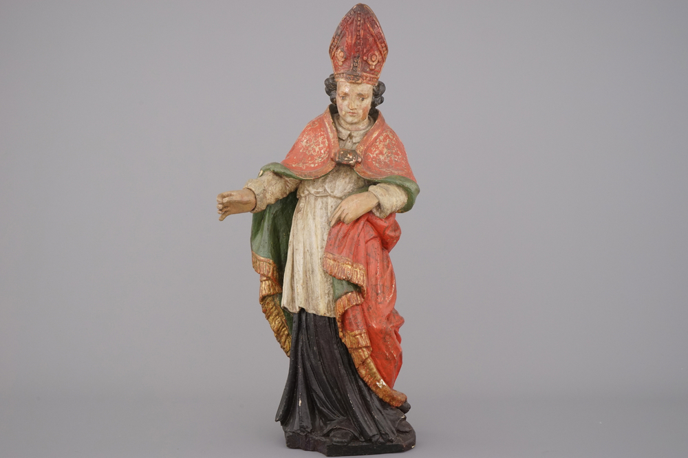 A polychrome carved wood figure of a bishop, 18th C.