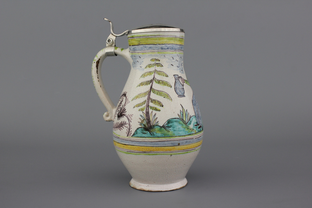 A German or Austrian faience beer jug with silver cover, ca. 1800
