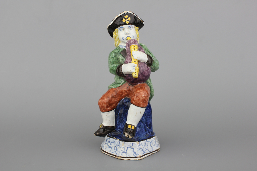 A Dutch Delft model of a bagpipe player, ca. 1800