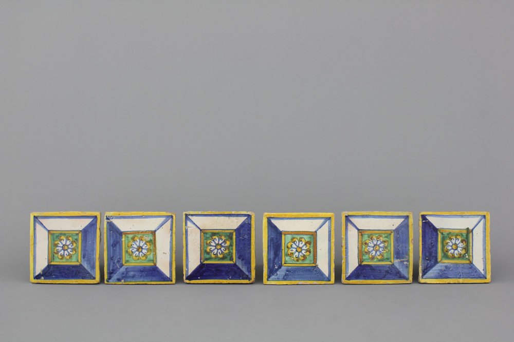 A set of six Spanish polychrome ornamental tiles, 17th C.