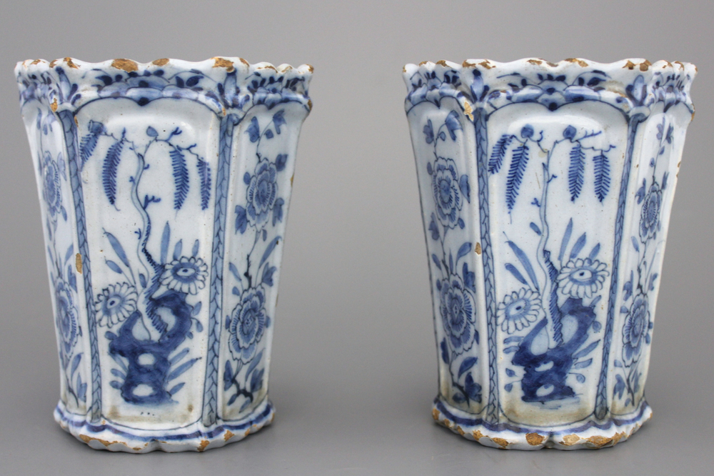A pair of Dutch Delft blue and white flower holders, 18th C.